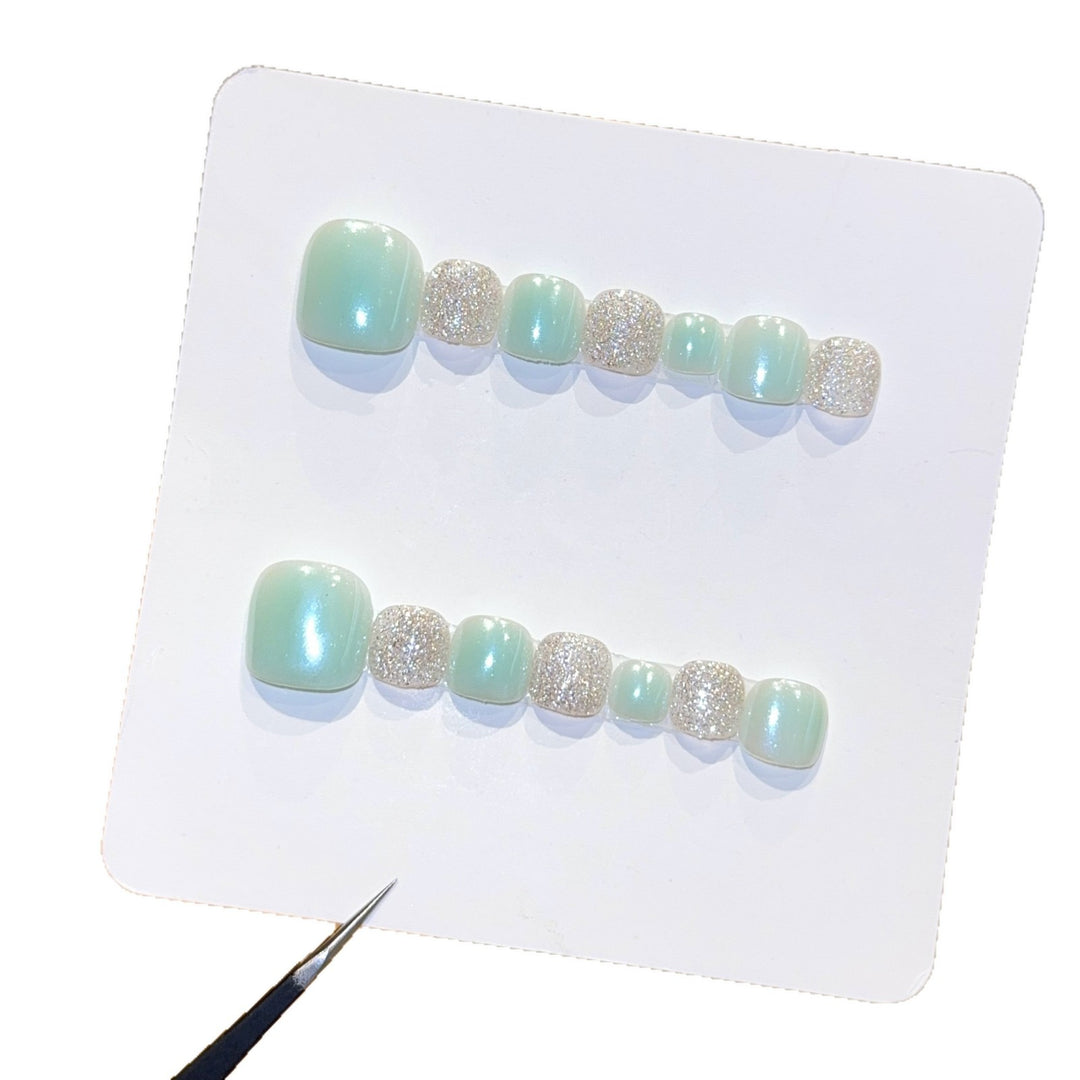 Acrylic nail set with glitter and pastel accent Stornfield