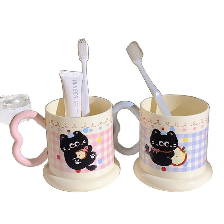 Ceramic mug with playful cat motif Stornfield