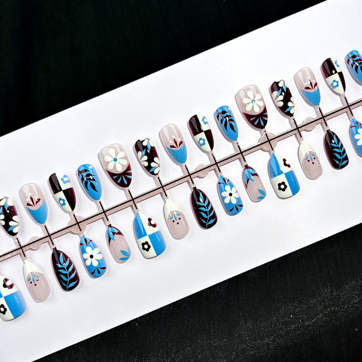 Artistic Press-On Nail Set with Floral and Geometric Designs