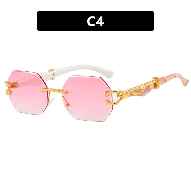 Women's fashionable sunglasses with extravagant octagonal design and golden accents Stornfield