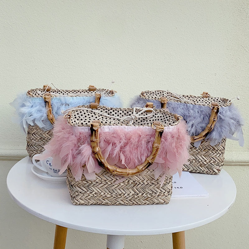 Elegant handbag with feathers and bamboo handles Stornfield