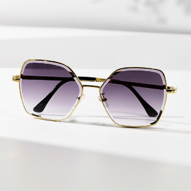 Women geometric sunglasses with fashionable gold frame Stornfield