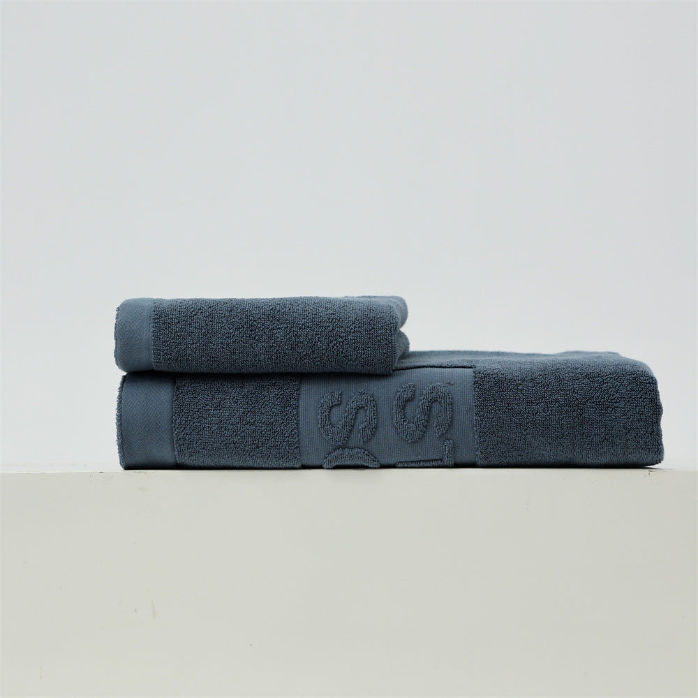 Luxury cotton terry towel set with logo border and extra soft Turquetto structure