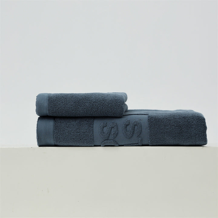Luxury cotton terry towel set with logo border and extra soft Turquetto structure