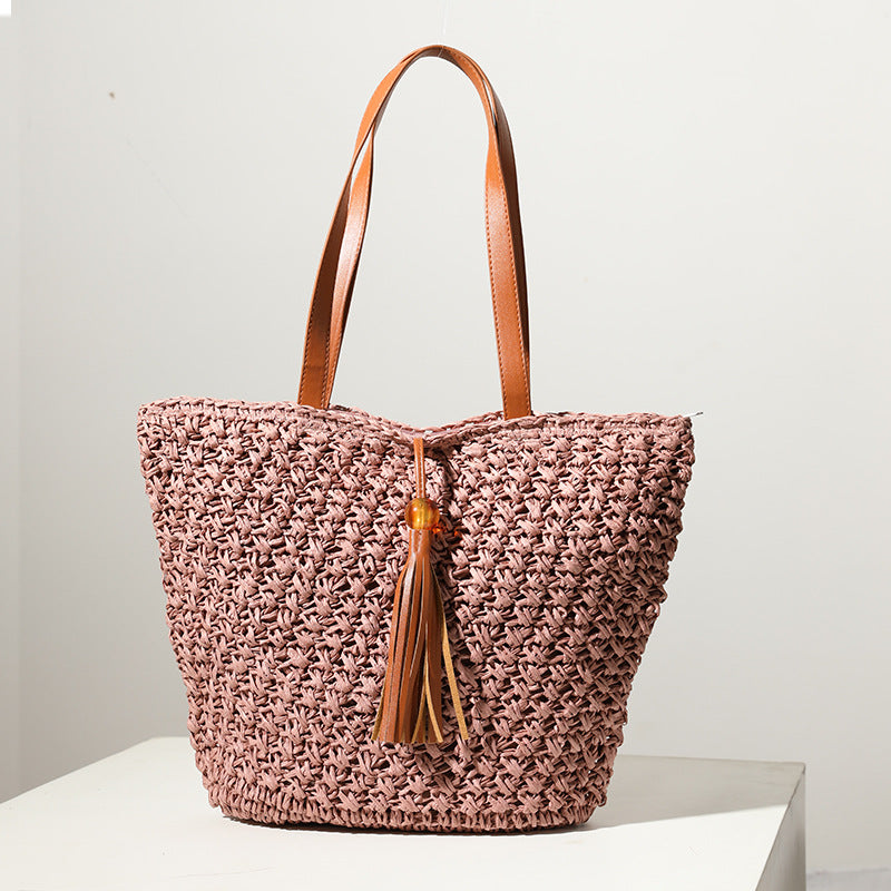 Handcrafted basket bag with fashionable tassel detail Stornfield