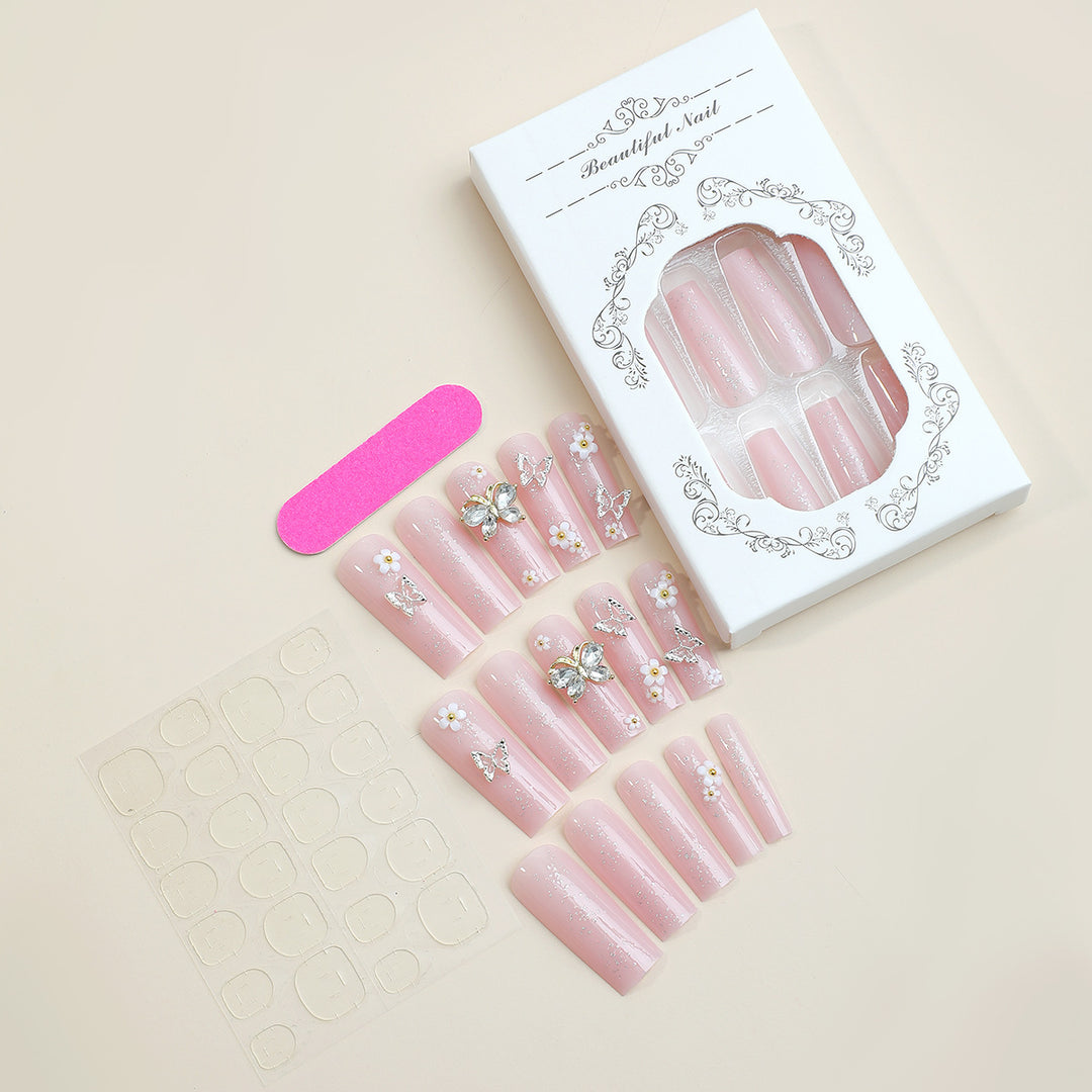 Artificial nail set with floral and glittering accents Stornfield