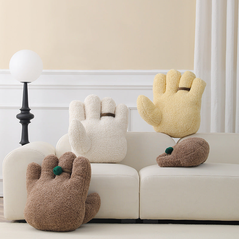 Cozy hand-shaped plush pillow with pompom ring