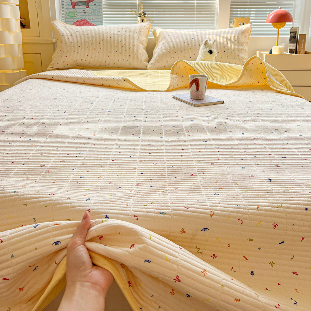 Textured Botanical Print Quilted Bedspread