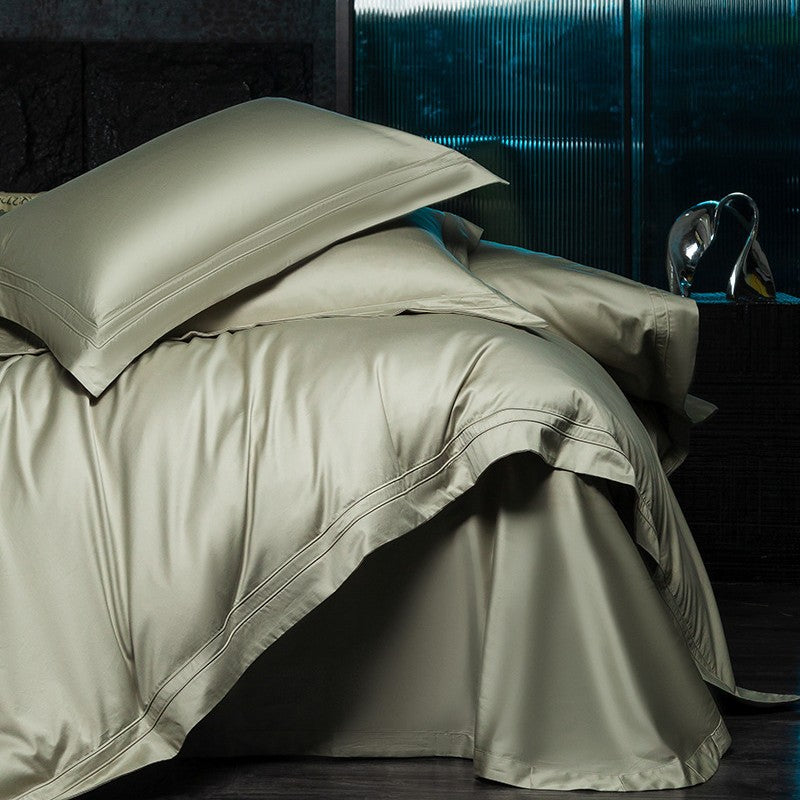 Exclusive cotton satin bedding set with a silky touch, double seam piping, and hotel closure