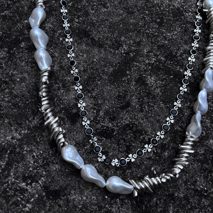 Fashionable chain belt with pearl and metal accents Stornfield