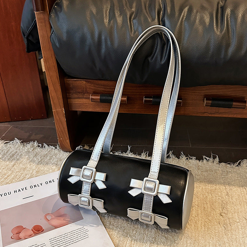 Bow-Accent Barrel Bag