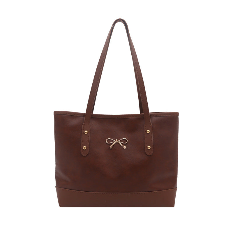 Elegant Faux Leather Tote Bag with Accent Bow
