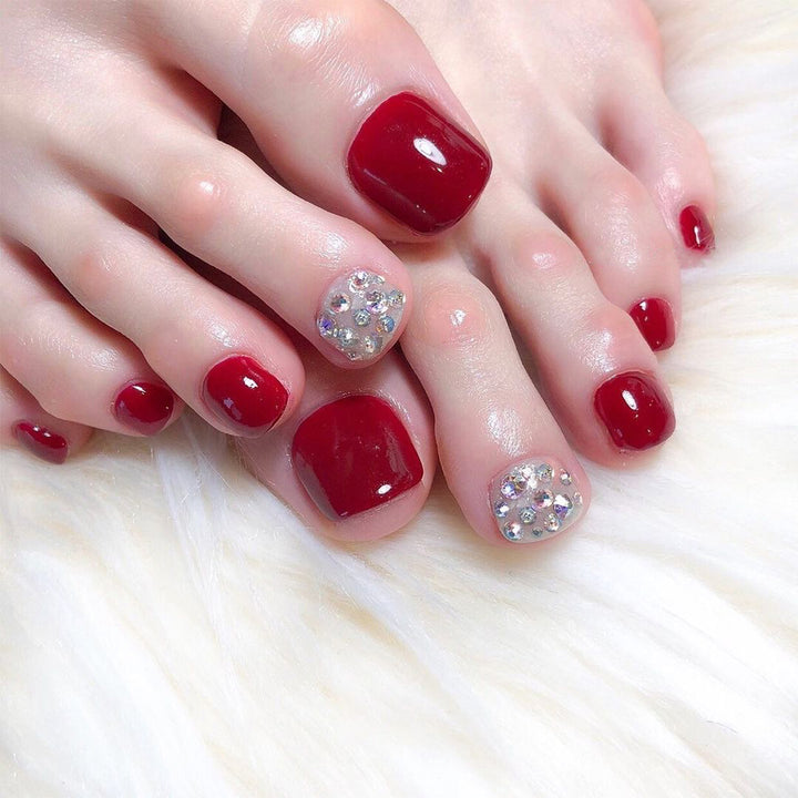 Stylish toenail design with glitter accents Stornfield