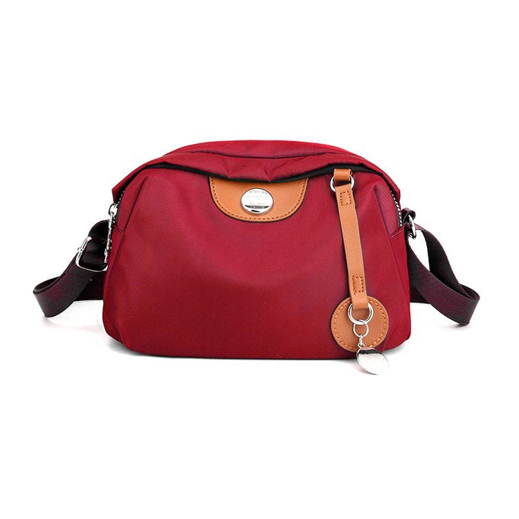 Shoulder bag with adjustable shoulder strap and clear compartment system Stornfield