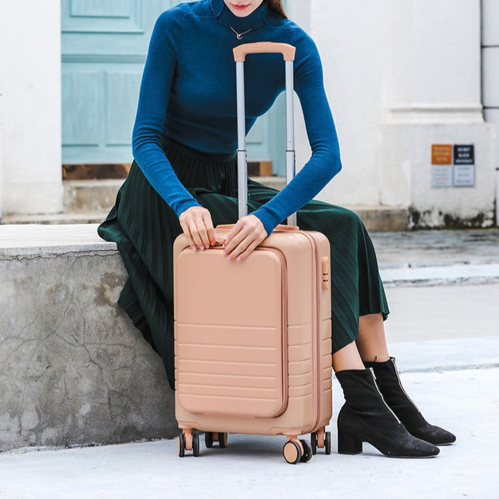 carry-on hardshell front-pocket spinner suitcase with quick-access compartment telescopic handle and smooth full-rotation wheels Stornfield