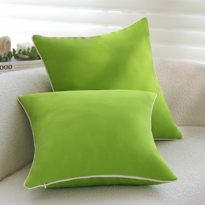 Square decorative pillow cover with contrasting piping and smooth microvelvet look Stornfield