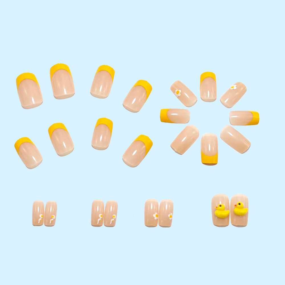 Artificial nails with playful duck design and summery color gradient Stornfield
