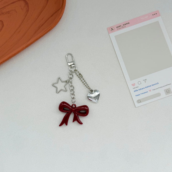 Playful Bow and Star Keychain Stornfield