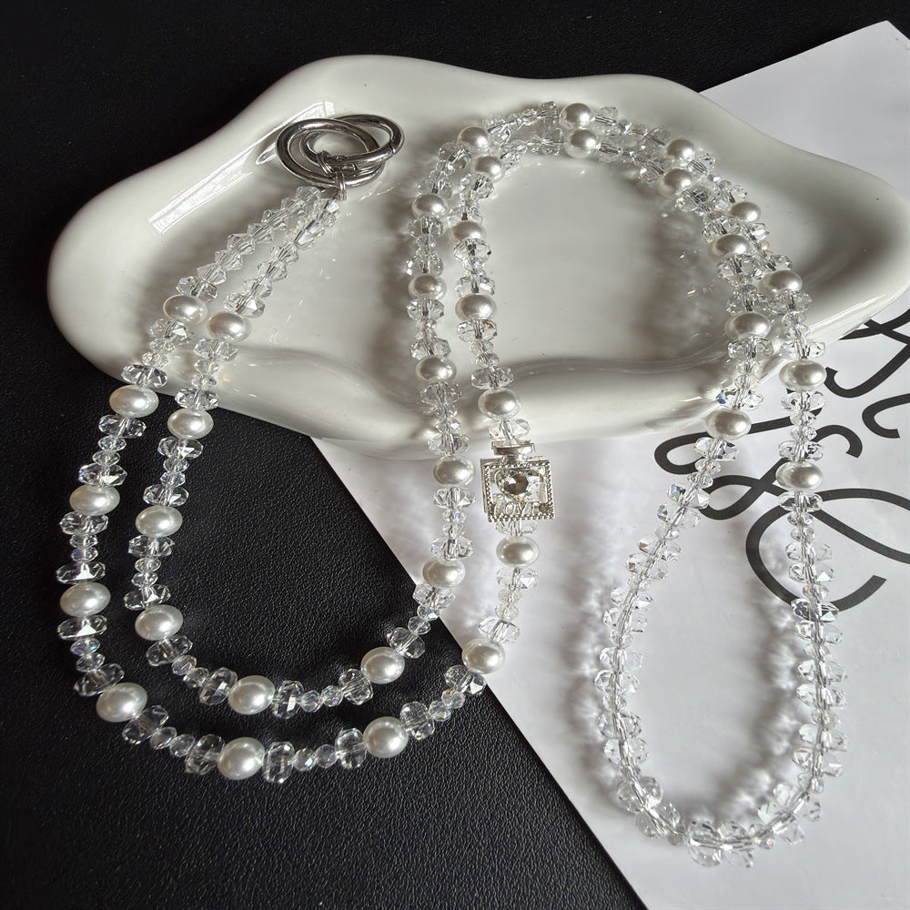 Elegant Pearl and Crystal Eyewear Holder Stornfield