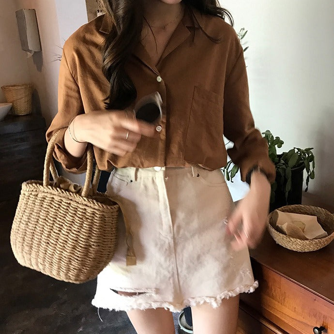 Handcrafted rattan bag with refined details Stornfield
