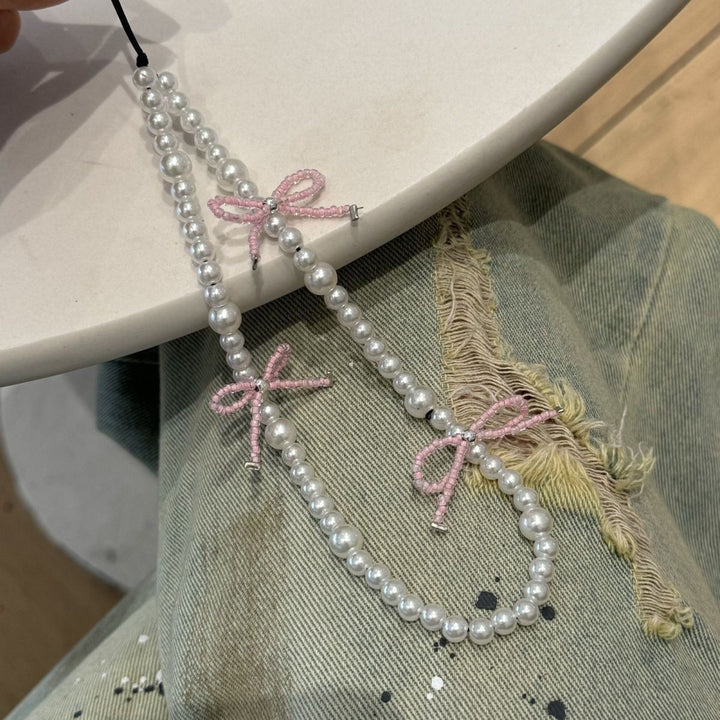 Decorative Pearl Beaded Necklace with Bow Accents Stornfield