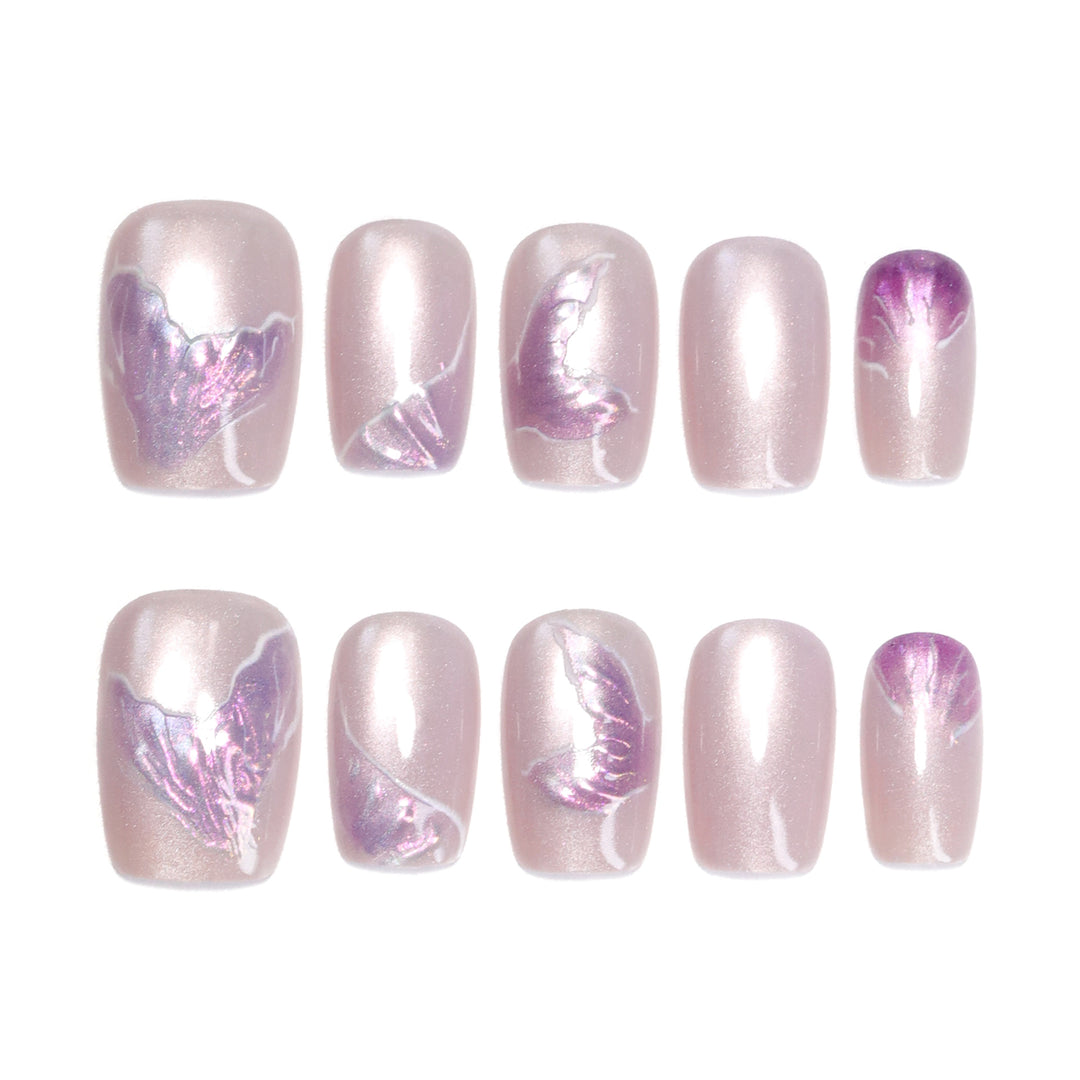 Artfully designed nail extensions with elegant flower motifs Stornfield