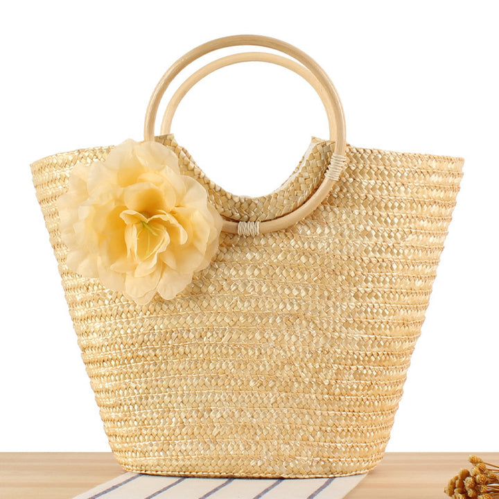 Braided straw bag with floral accent Stornfield