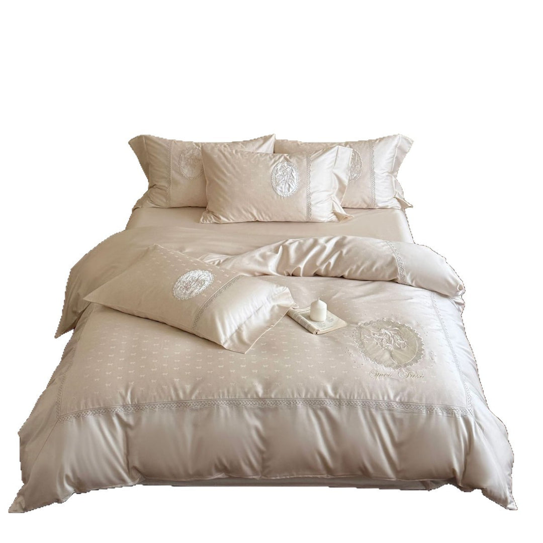 Luxurious cotton satin bedding set with embroidered medallion appliqués and lace trim
