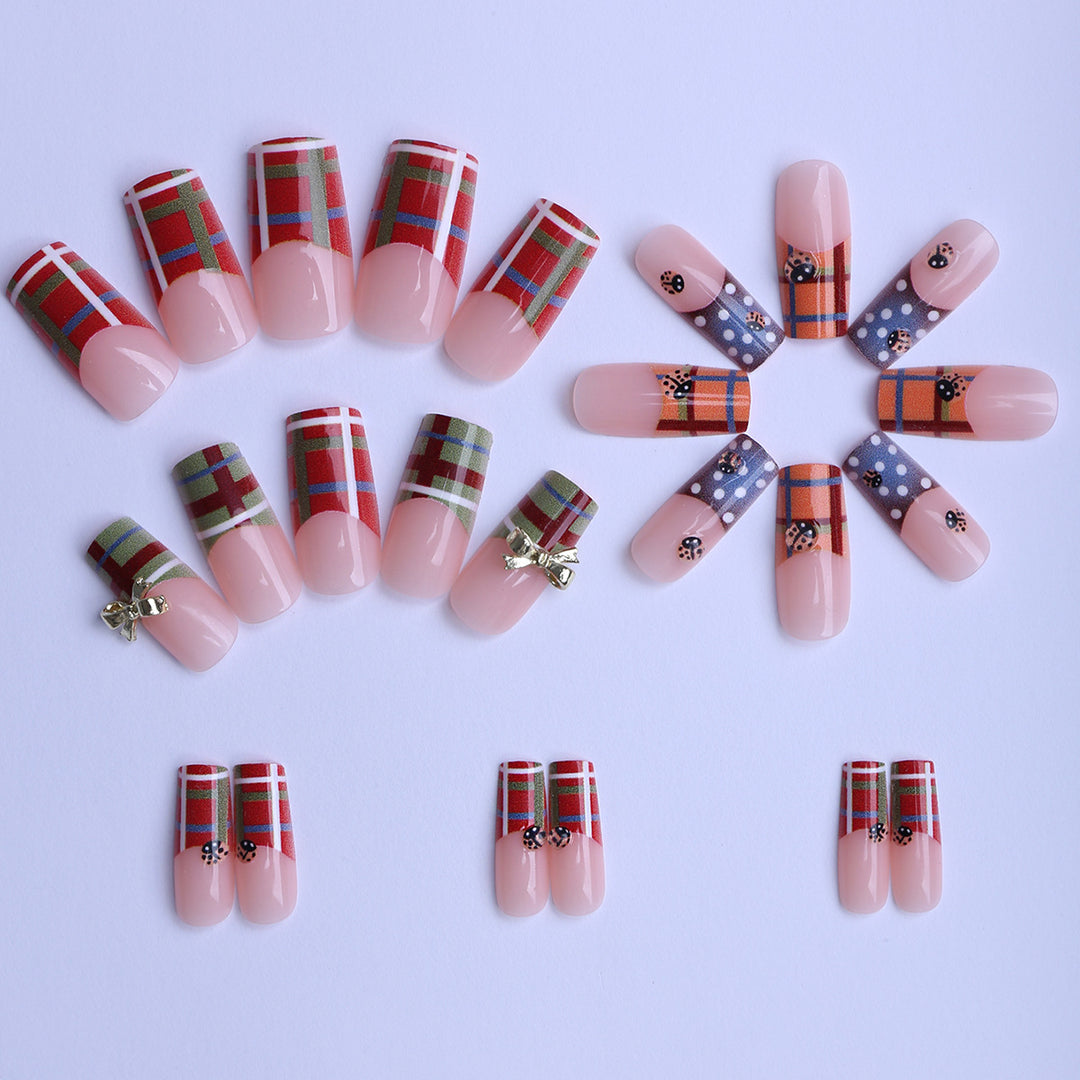 Artificial nails with unique plaid pattern and 3D applications Stornfield