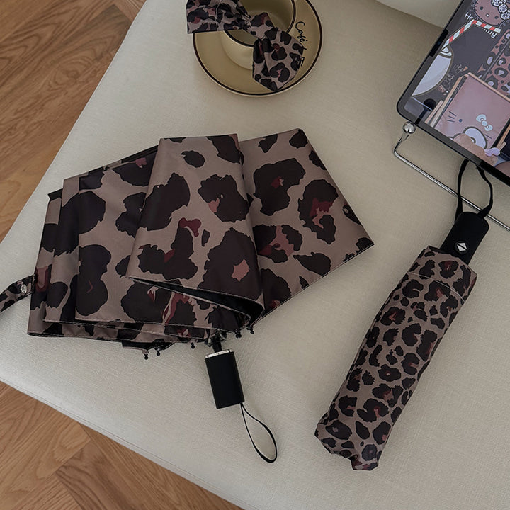 Women's Foldable Umbrella in Modern Leopard Pattern Stornfield