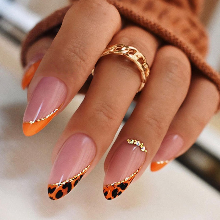 Creative nail art set with leopard pattern and glitter accents Stornfield