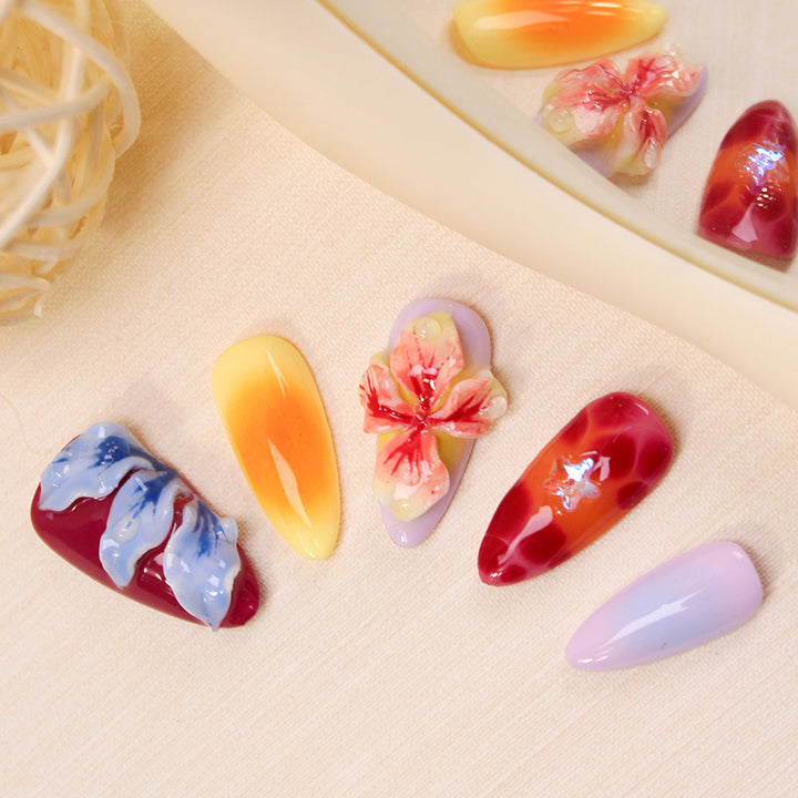 Artificial nail set with floral 3D accents and colorful designs Stornfield