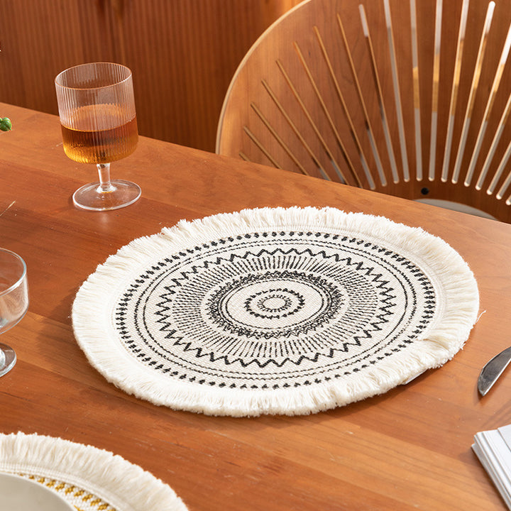 Round woven Boho rug mat with decorative fringes Stornfield
