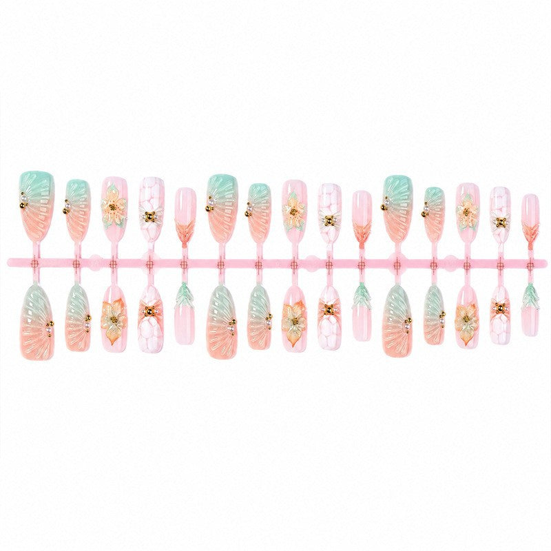 Artificial nail set with glamorous flower and glitter details Stornfield