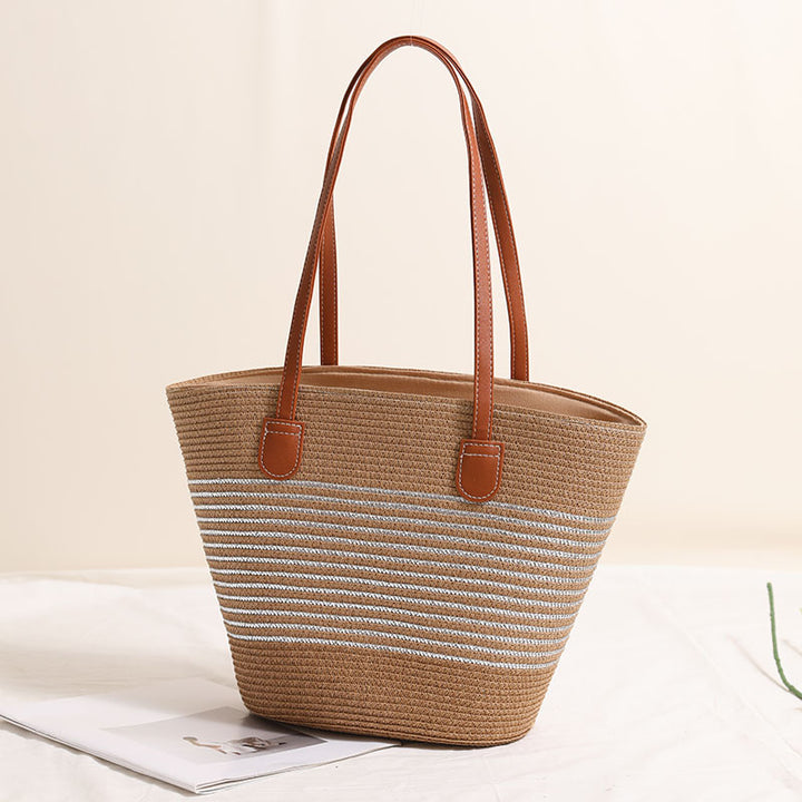 Elegant bast handbag with leather accents Stornfield