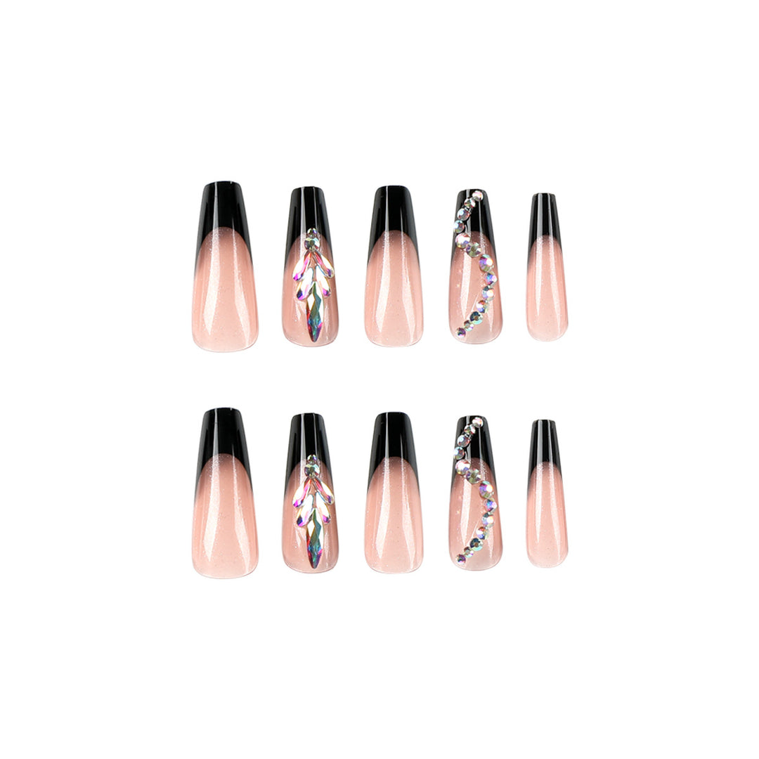 Artistic stiletto nails with glitter embellishments Stornfield