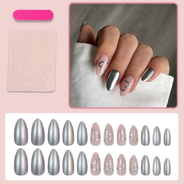 Artificial nail set with luxurious silver finish and heart motifs Stornfield