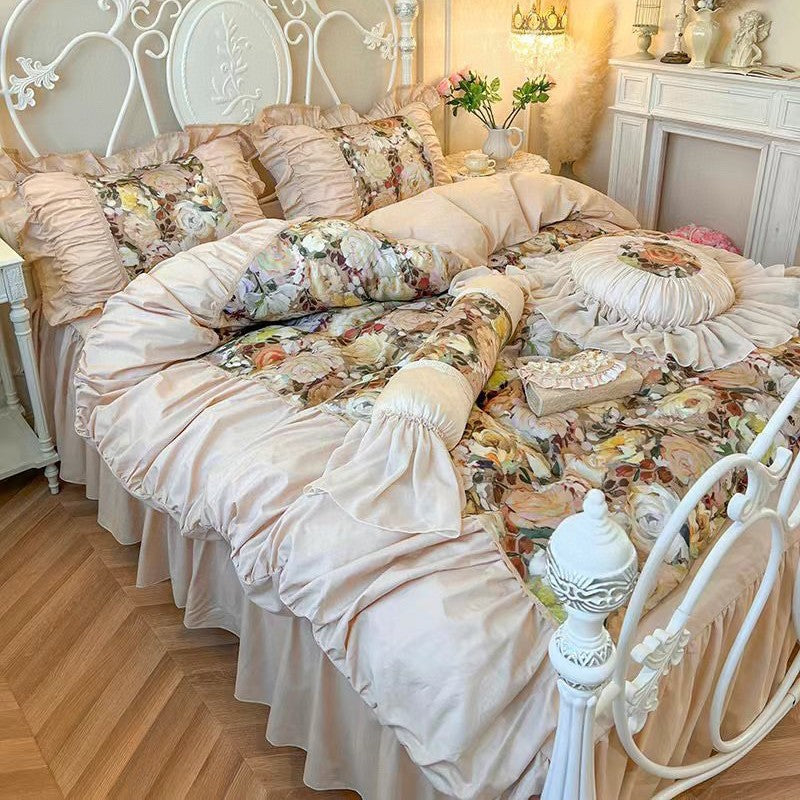 Romantic bedding set with ruffles, quilted bedspread and decorative cushion