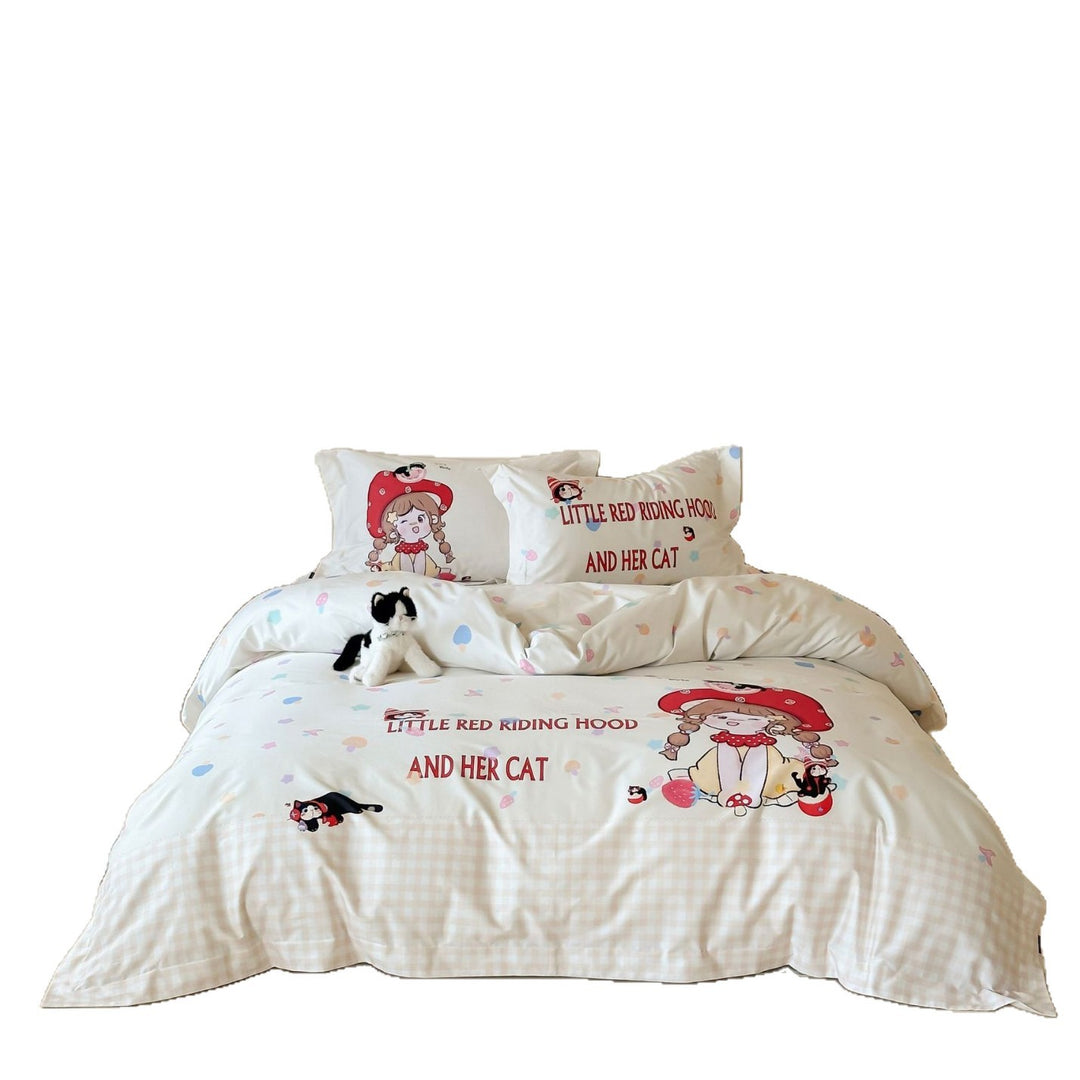 Bedding set for children made of cotton satin with contrasting piping and puppy print