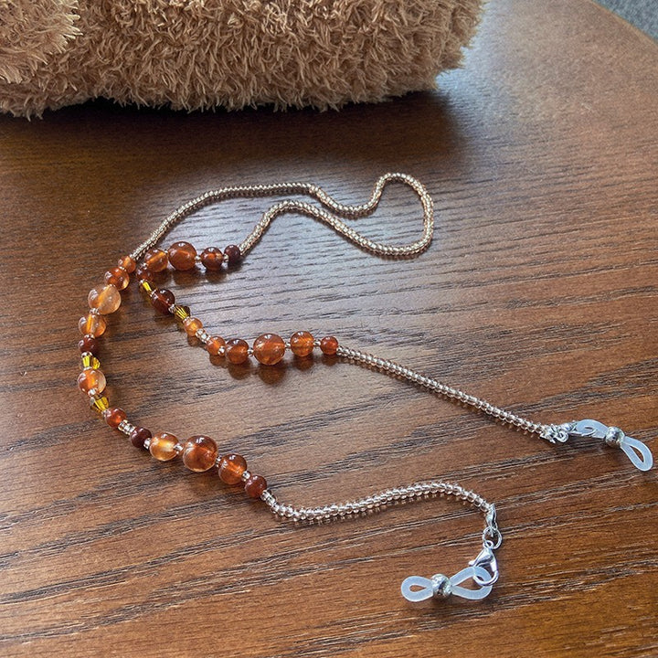 Stylish glasses holder chain with colorful accents Stornfield