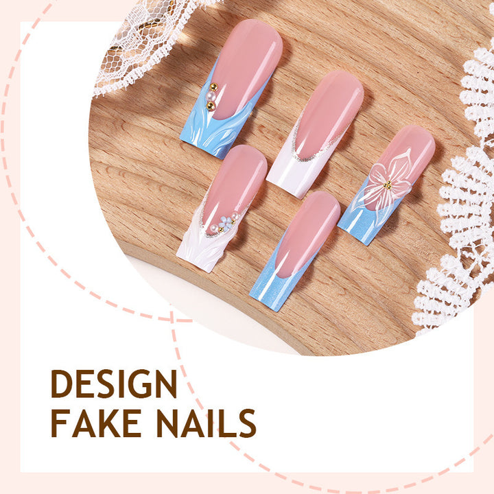 Nail set with elegant floral accents and glitter Stornfield