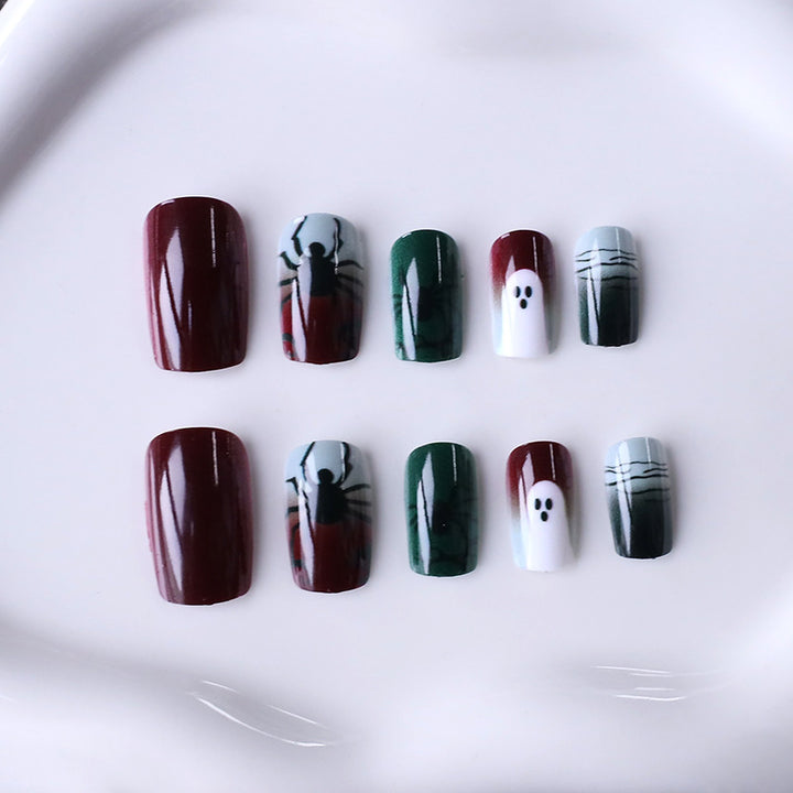 Halloween-Themed Spider and Ghost Nail Art Stornfield