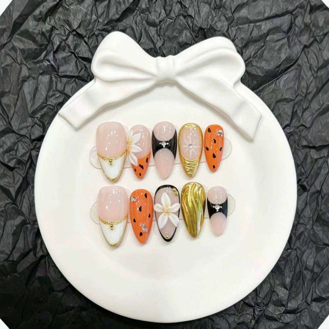 Decorative Press-On Nail Art Set with Floral and Metallic Accents