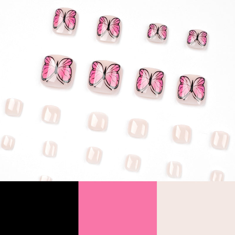 Artful toenail design with butterfly design Stornfield