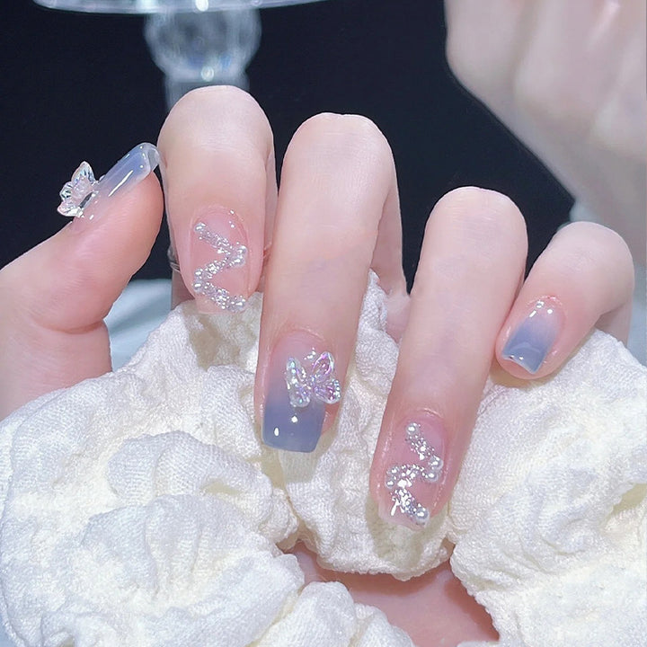 Acrylic nail set with sparkling glitter elements and appealing ombre design Stornfield