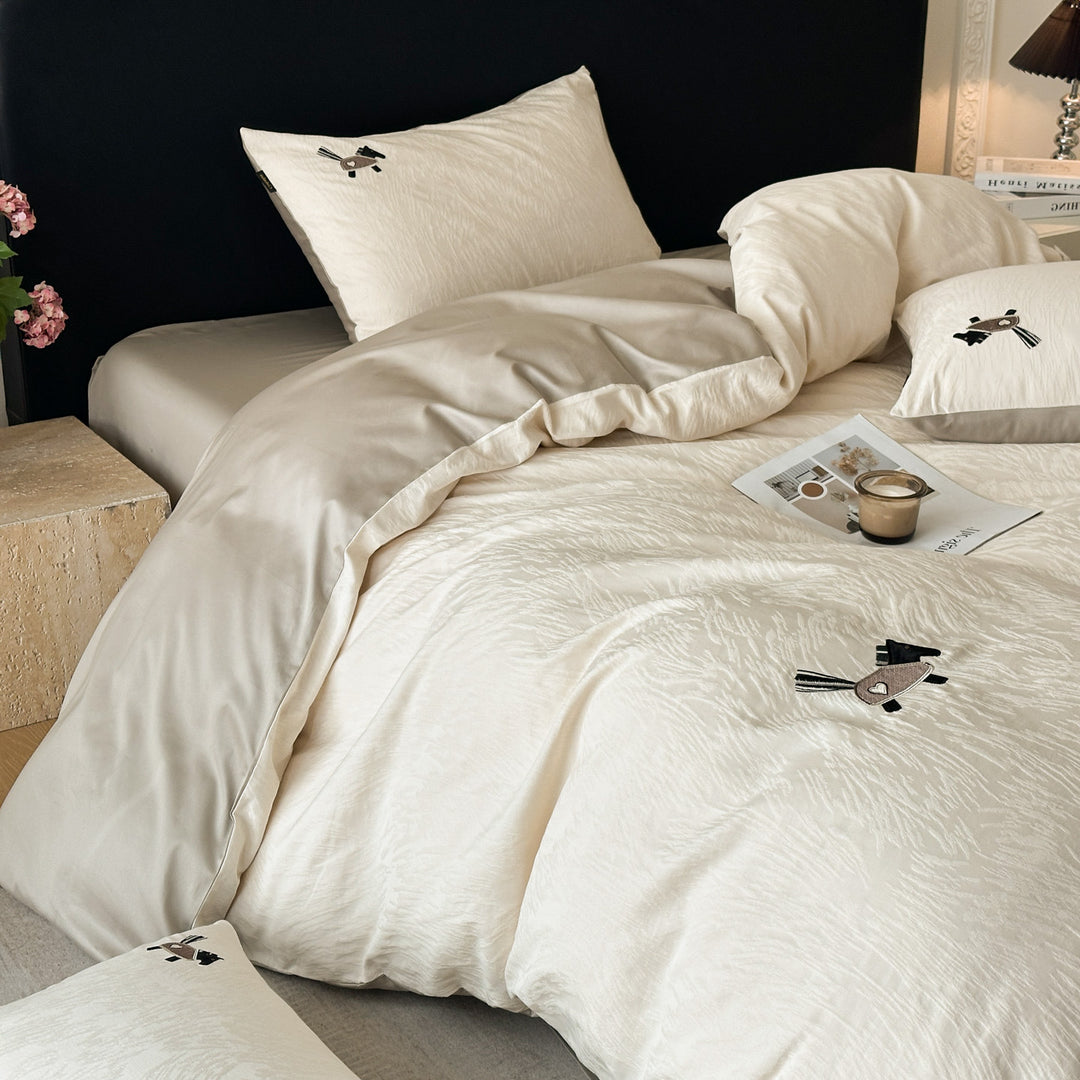 Bedding set in linen look with delicate flower embroidery