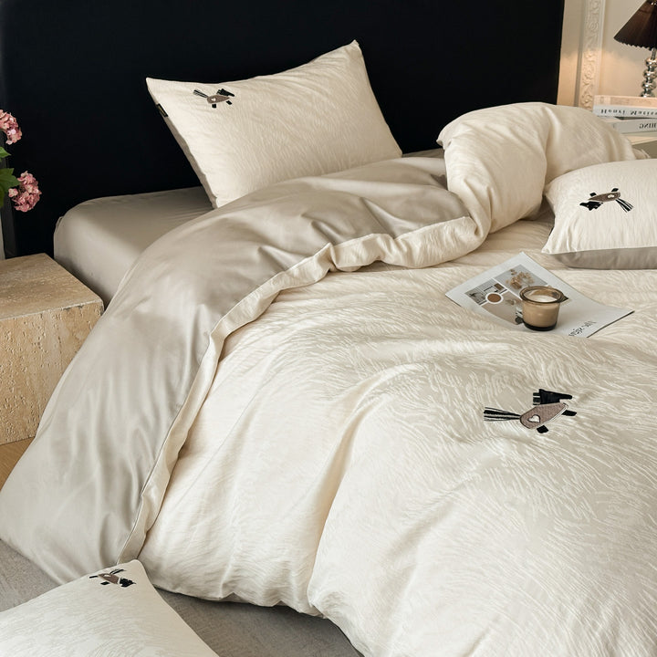 Bedding set in linen look with delicate flower embroidery