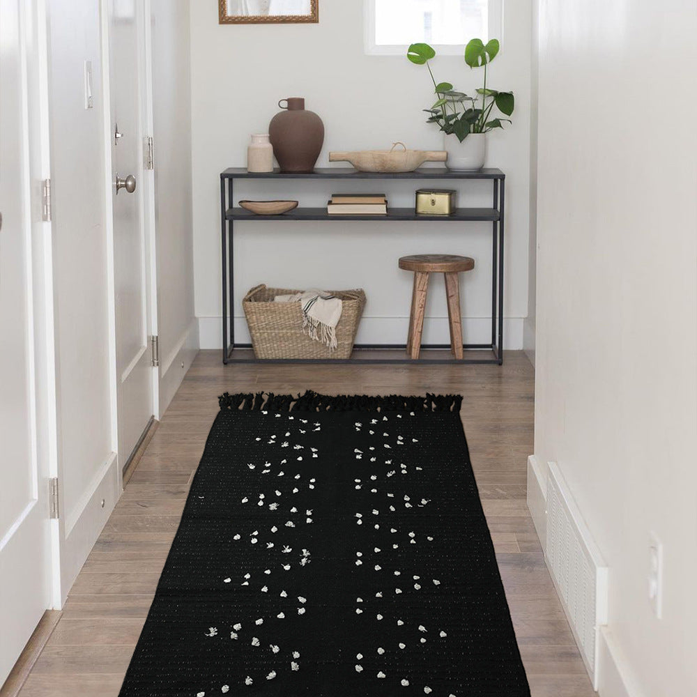 Handwoven cotton rug with dot tuft zigzag and fringed edge
