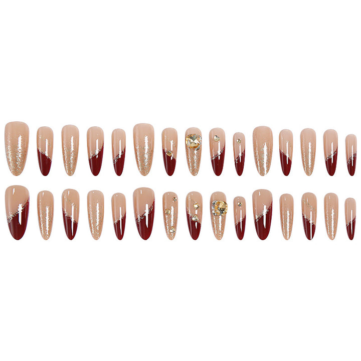 Acrylic nail set with elegant glitter design and exclusive embellishments Stornfield