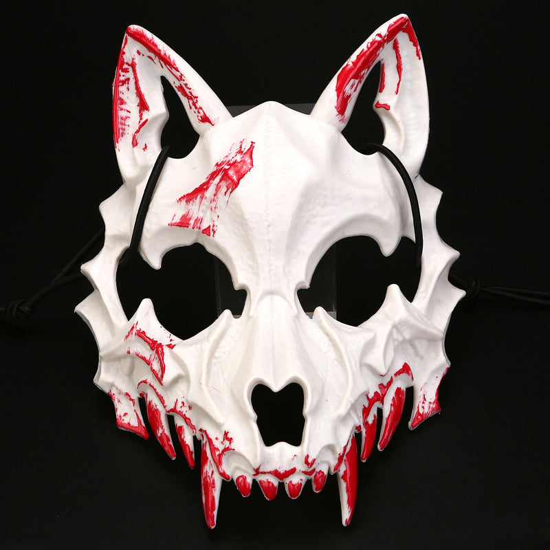 Half-face mask with flashing vampire teeth and adjustable rubber band